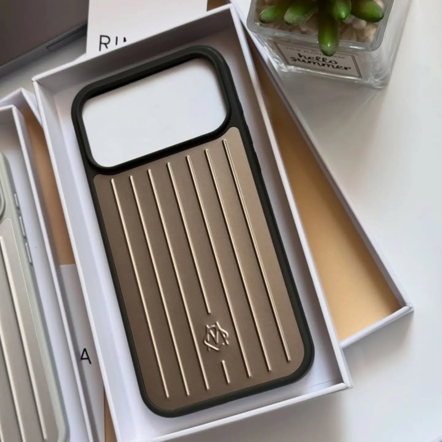 Gold Rimowa iPhone 17 Pro Max Case - Luxury Travel Design