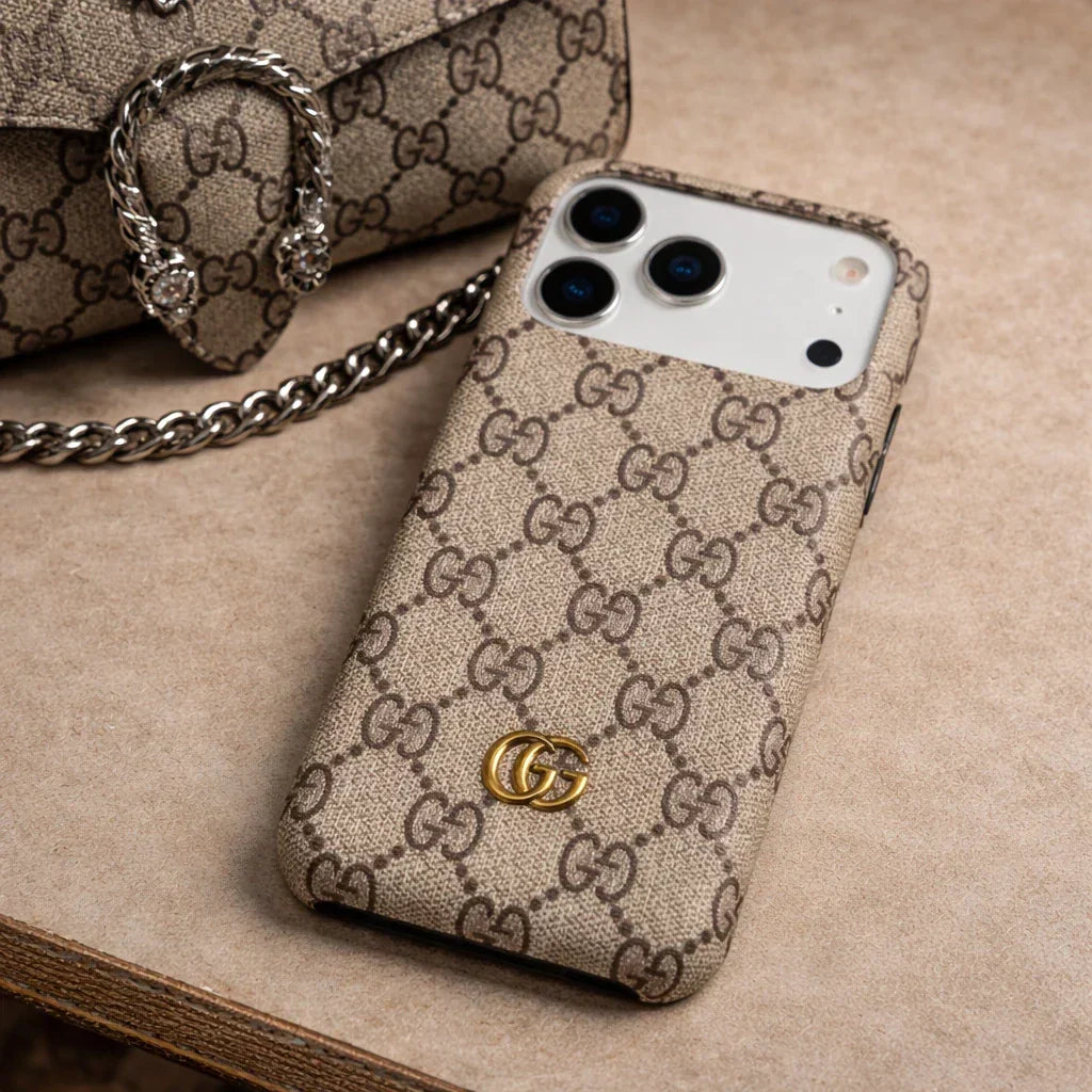 Gucci Ophidia iPhone 17 Pro Max Case in beige GG canvas monogram pattern – front view | NUVALOVA